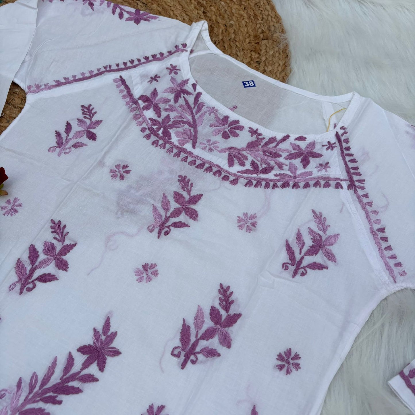 Naaz White Base Pure Mulmul Chikankari Short Kurti with Color Threadwork